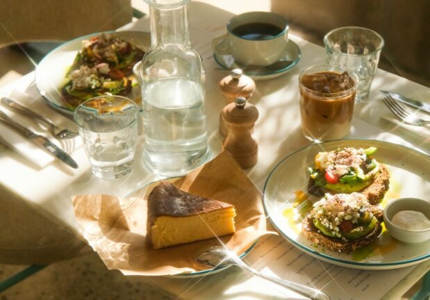 A wide variety of breakfast foods and beverages.