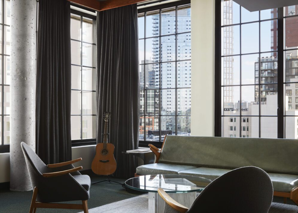 ace suite at ace hotel brooklyn a view of the living rooms with floor to ceiling windows
