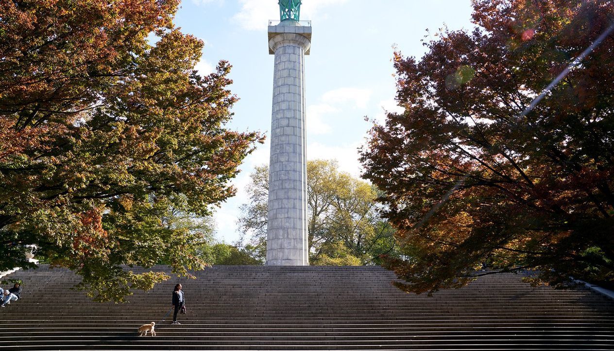 Prison Ship Martyrs monument in Fort Greene, Brooklyn and autumn trees
