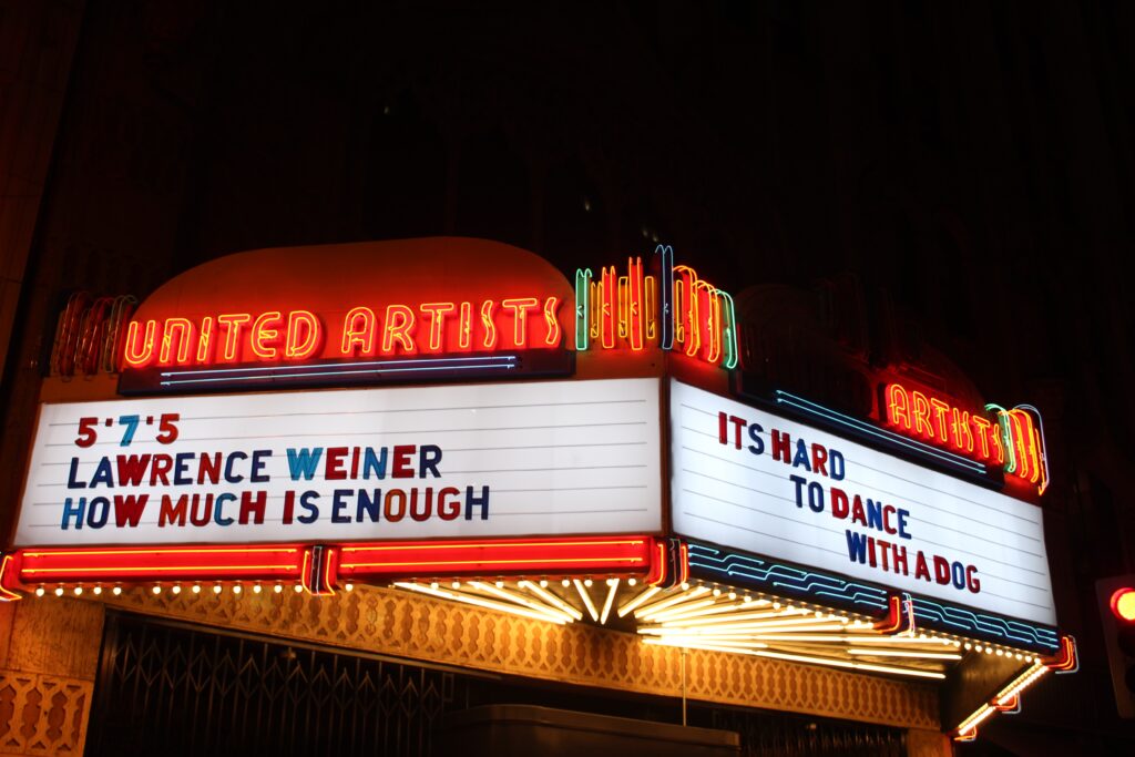 United Artists Marquee displaying Its Hard to Dance With a Dog