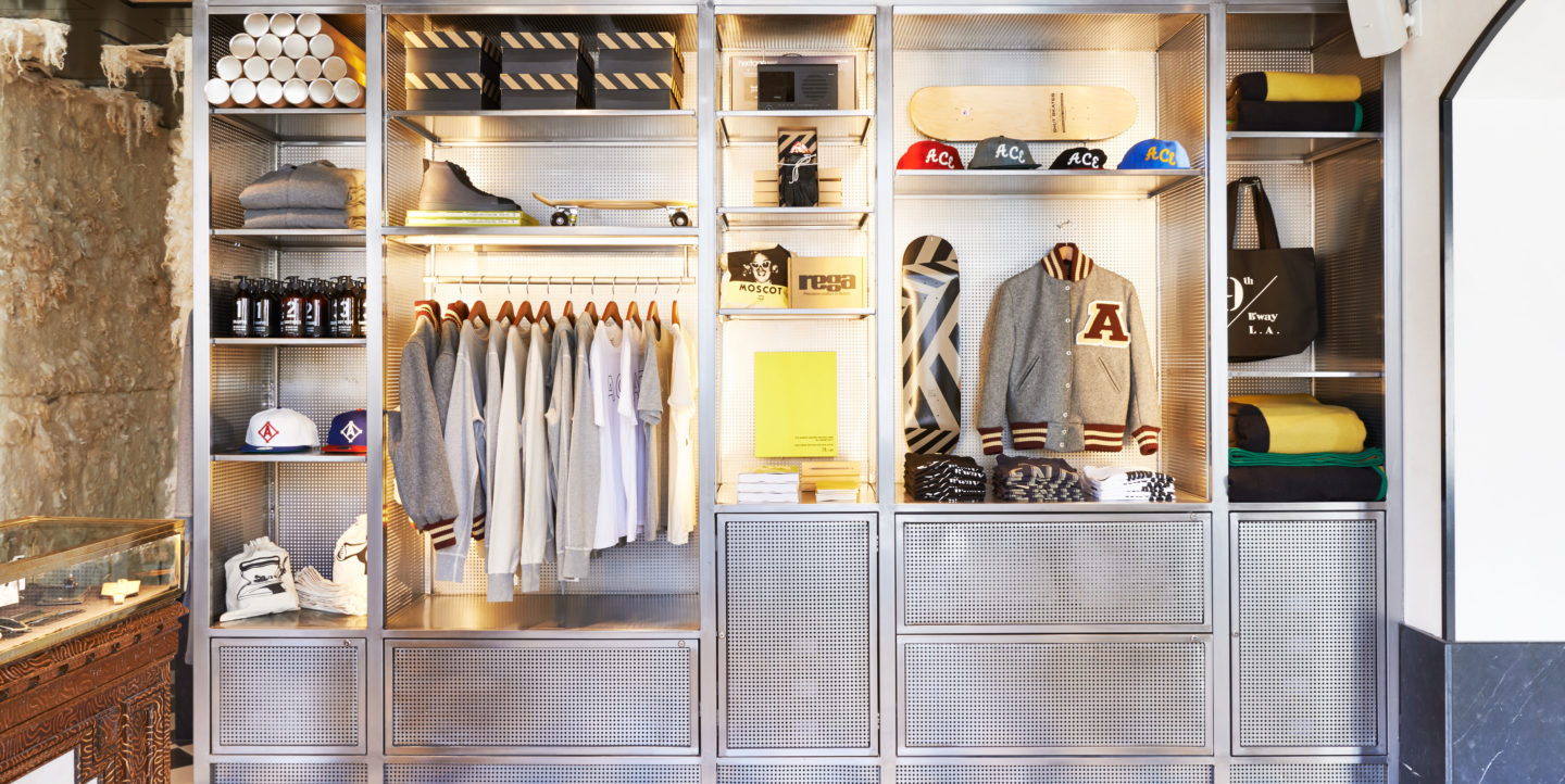 Shelves featuring Ace Hotel clothing, hats and other merchandise
