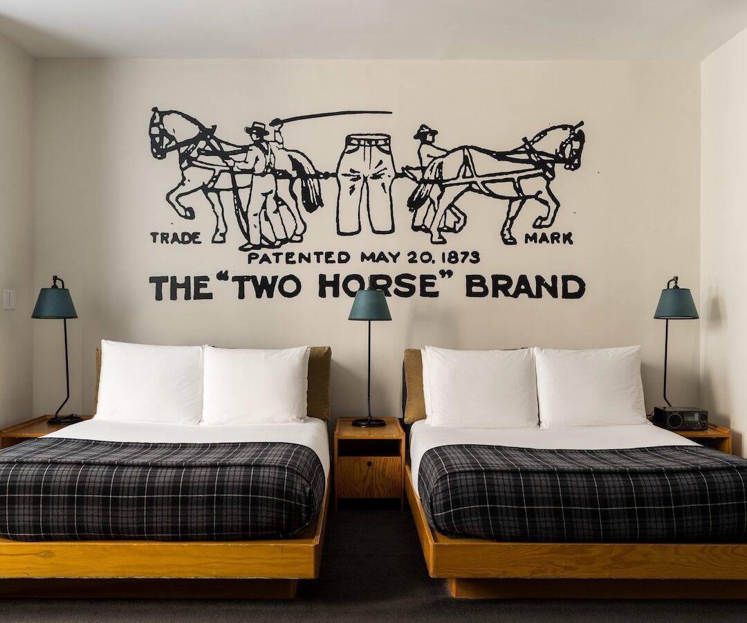 Double room at Ace Hotel New York with two beds and original custom art