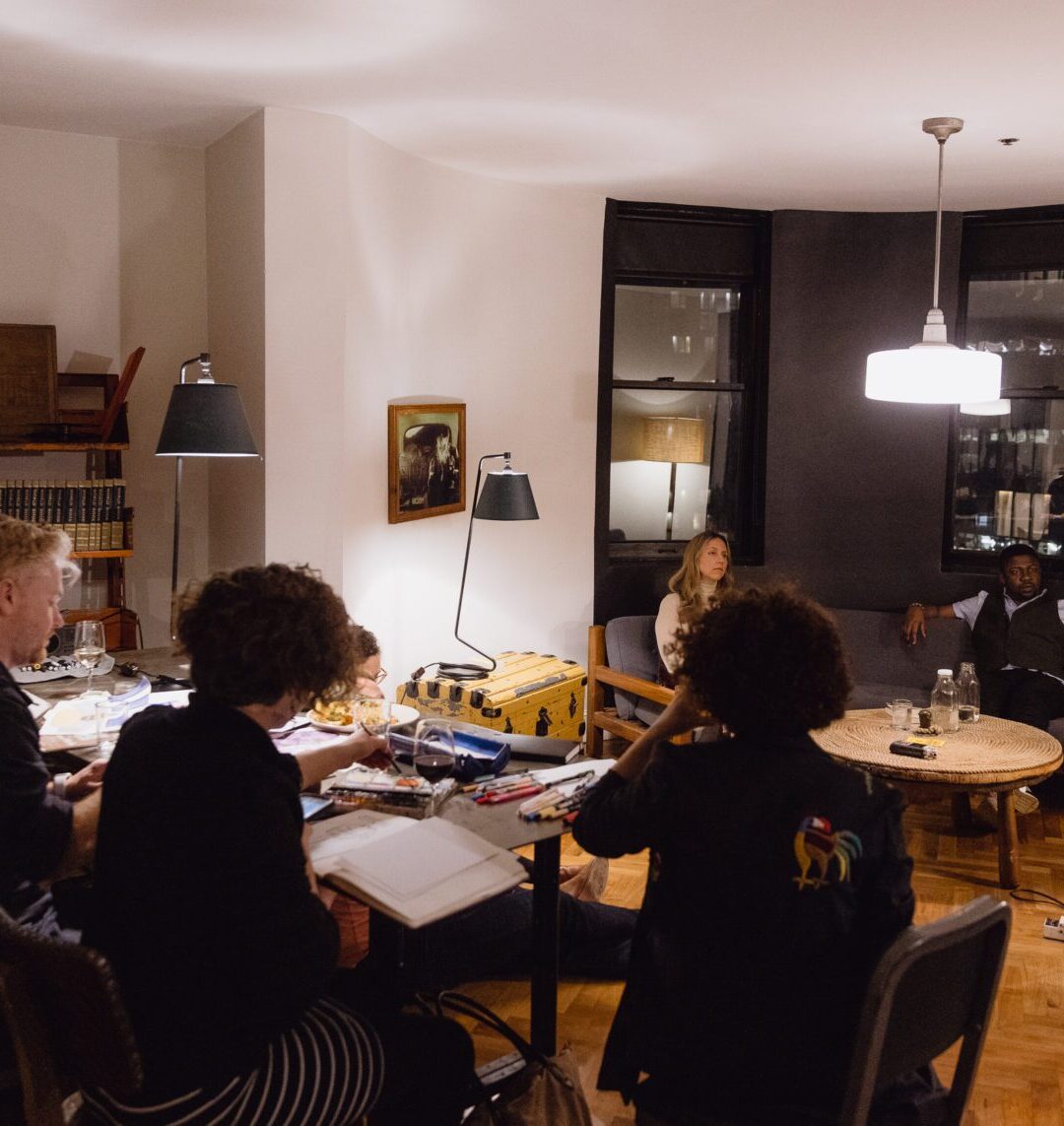 Group workshop around tables in an event space at Ace Hotel New York