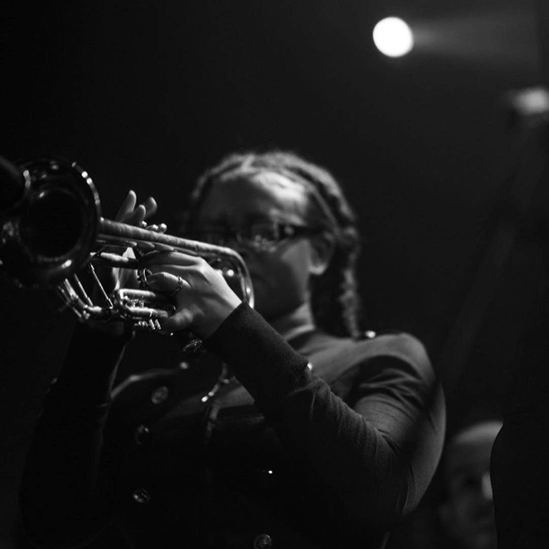 person playing a trumpet