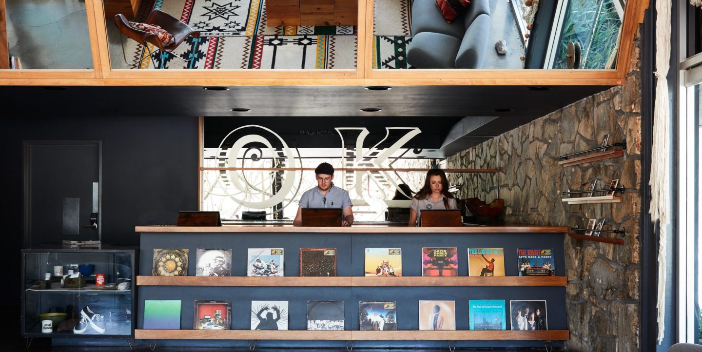 Checkout counter with records on display at the Ace Hotel shop