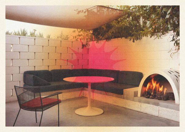 a patio with fireplace at ace hotel palm springs