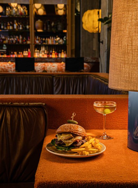 LOAM burger and martini in a beautiful lobby