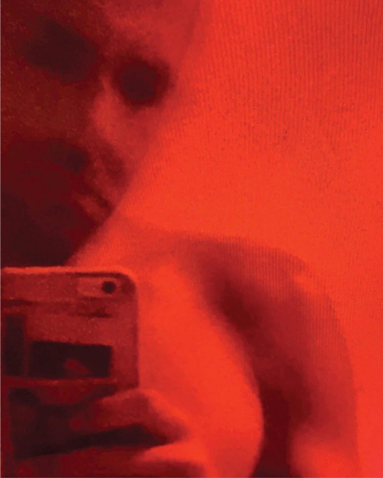 blurred selfie in red
